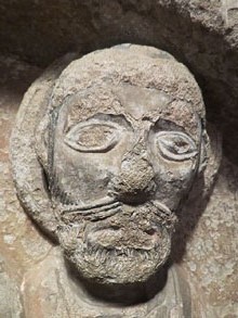 Timpà de l'església de Sant Pol. Segle XII. Detall del cap de Sant Pere. Original del Museu de Sant Joan de les Abadesses