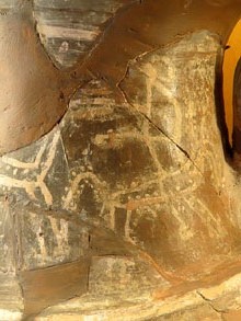 Detall d'un gerro bicònic, amb coll llarg i vora oberta, amb dues nanses. Decorat amb escena de genet que porta un altre cavall agafat per les regnes, 425-375 aC
