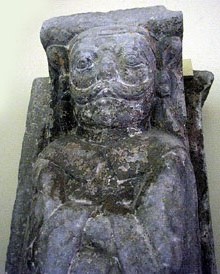 Atlant. Suport de pedra que sostenia l'altar major. Segles XVI-XVII