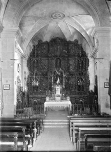 Retaule major de l'altar de l'església de Sant Iscle i Santa Victòria de Bàscara, obra de Vicens Falcó, Mateu Solivera i Jaume Timó. 1925